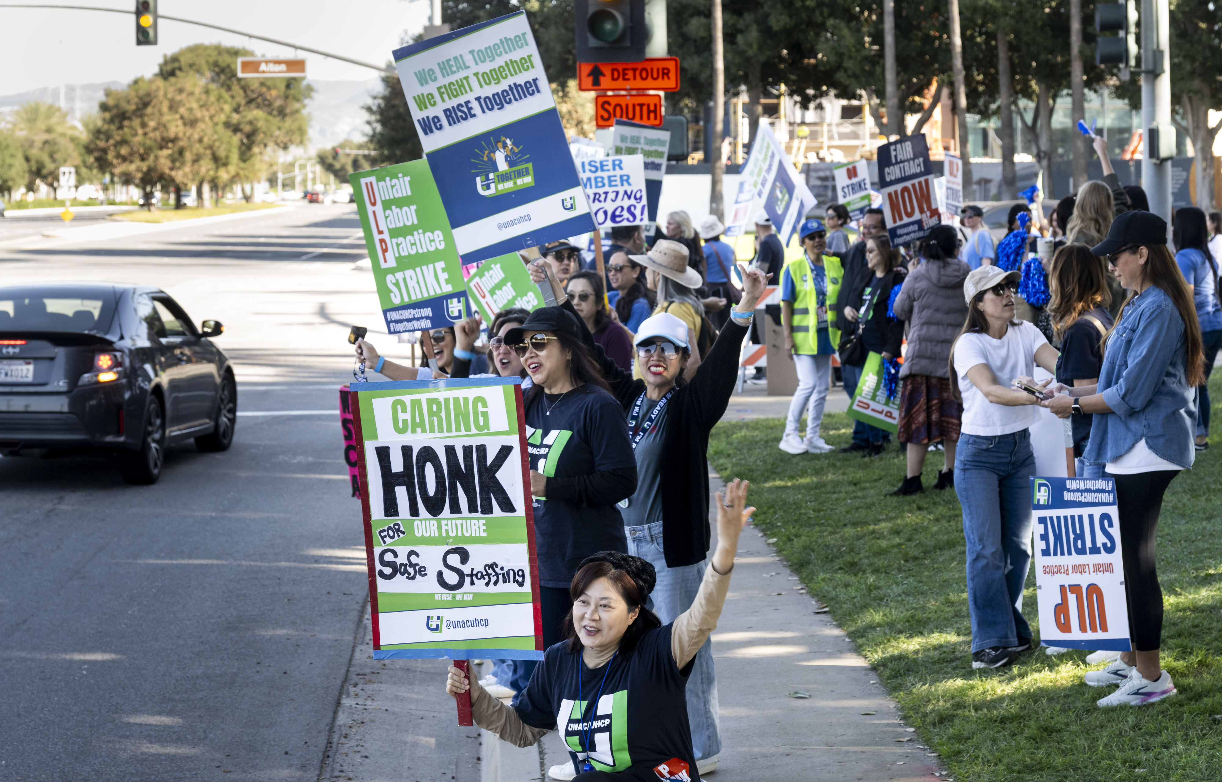Workers protest at Kaiser Permanente on Alton Pkwy. in Irvine,...