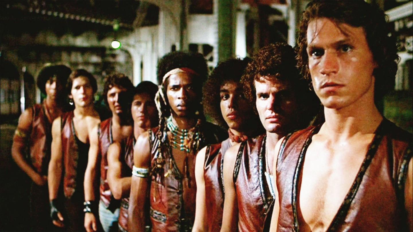Warriors gang members, from background left to right: Brian Tyler as Snow, James Remar as Ajax, Terry Michos as Vermin, Tom McKitterick as Cowboy, David Harris as Cochise, Marcelino Sanchez as Rembrandt, Thomas G. Waites as Fox, and Michael Beck as Swan.