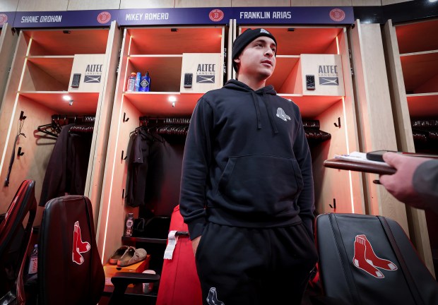 Boston Red Sox rookie infielder Mikey Romero is interviewed during Rookie Development Day at Fenway Park, Tuesday. (Mark Stockwell/Boston Herald)