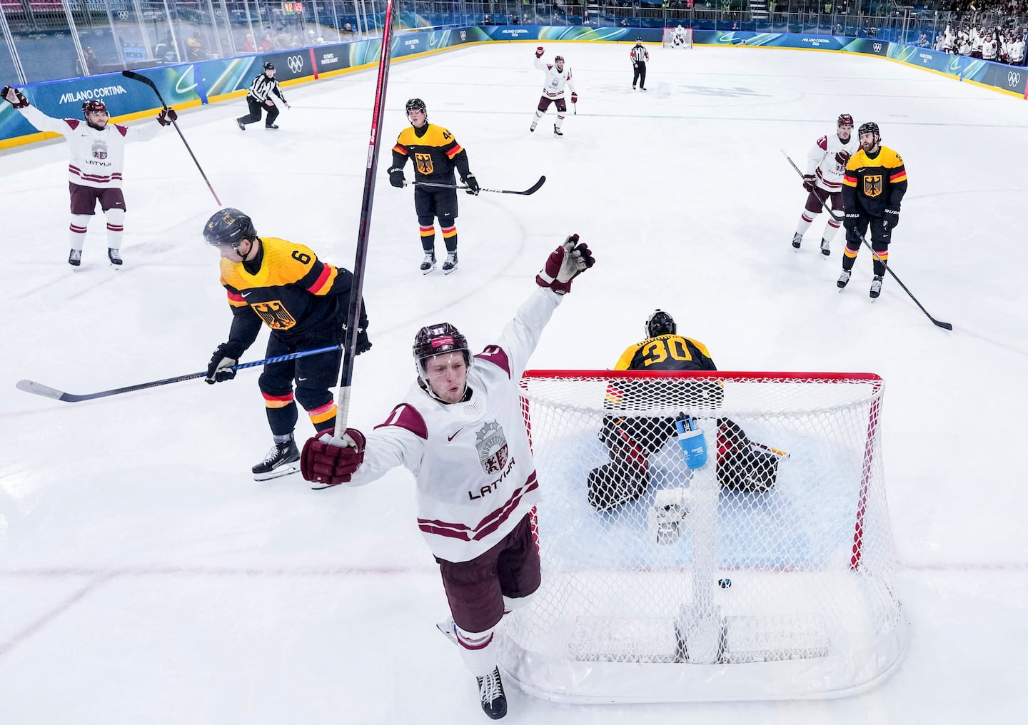 Dans Locmelis, a UMass product and Bruins prospect, twice tied what became a Latvian upset of Germany on Saturday.