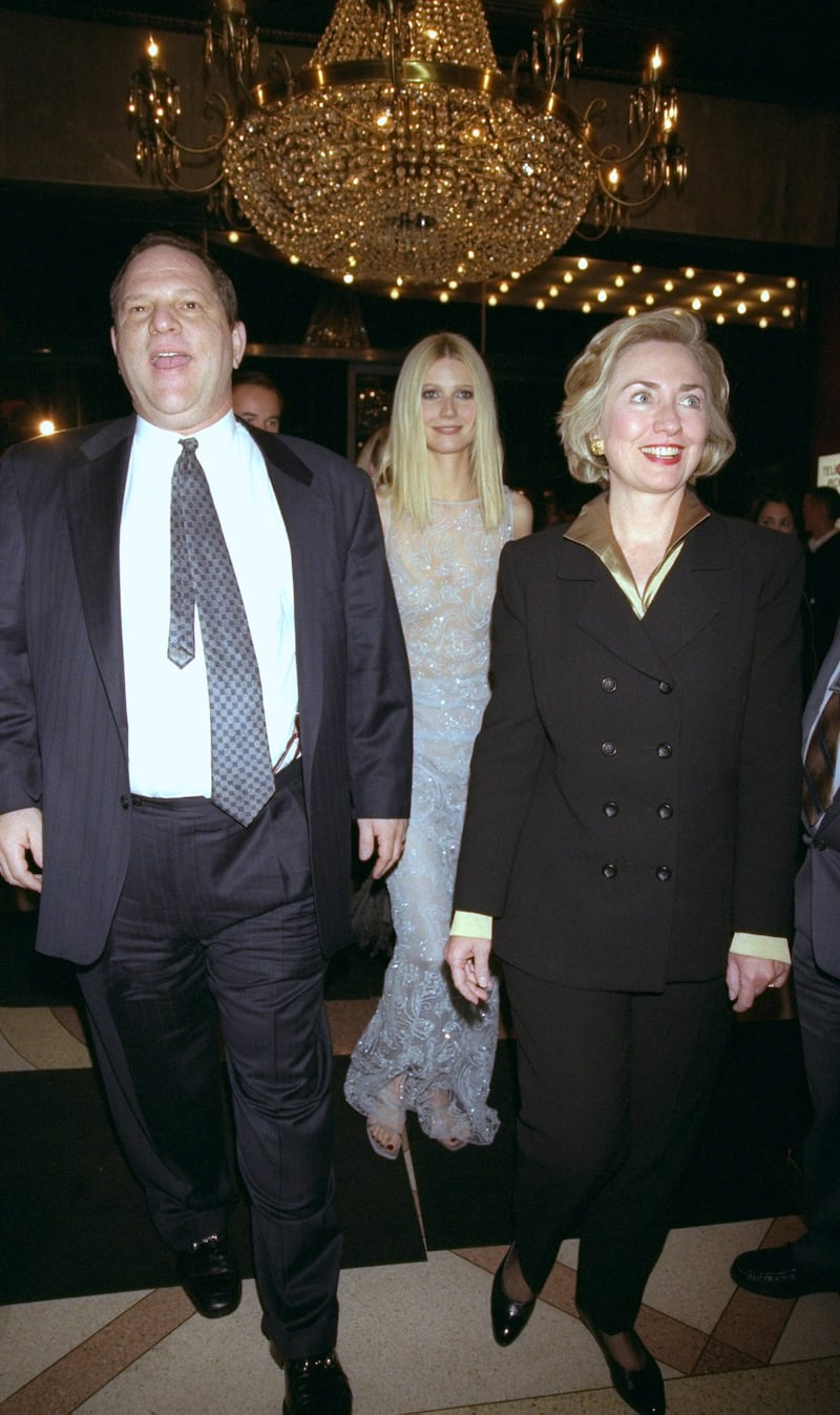 First Lady Hillary Rodham Clinton is joined by actress Gwyneth Paltrow (center) and Harvey Weinstein at the premiere of "Shakespeare in Love"