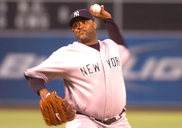 CC Sabathia fires a pitch during a game against the A's in Oakland in 2009. (Chris Riley/Times-Herald)