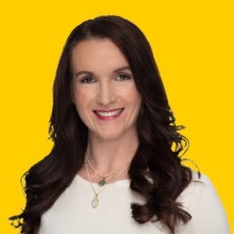 woman's headshot on bright orange backdrop