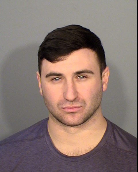 A white man poses for a photo 