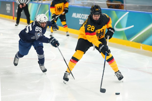 Katarina Jobst-Smith of Team Germany controls the puck 