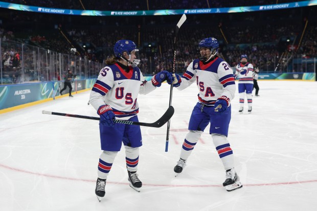Alex Carpenter of Team United States celebrates with teammate Joy Dunne after a goal