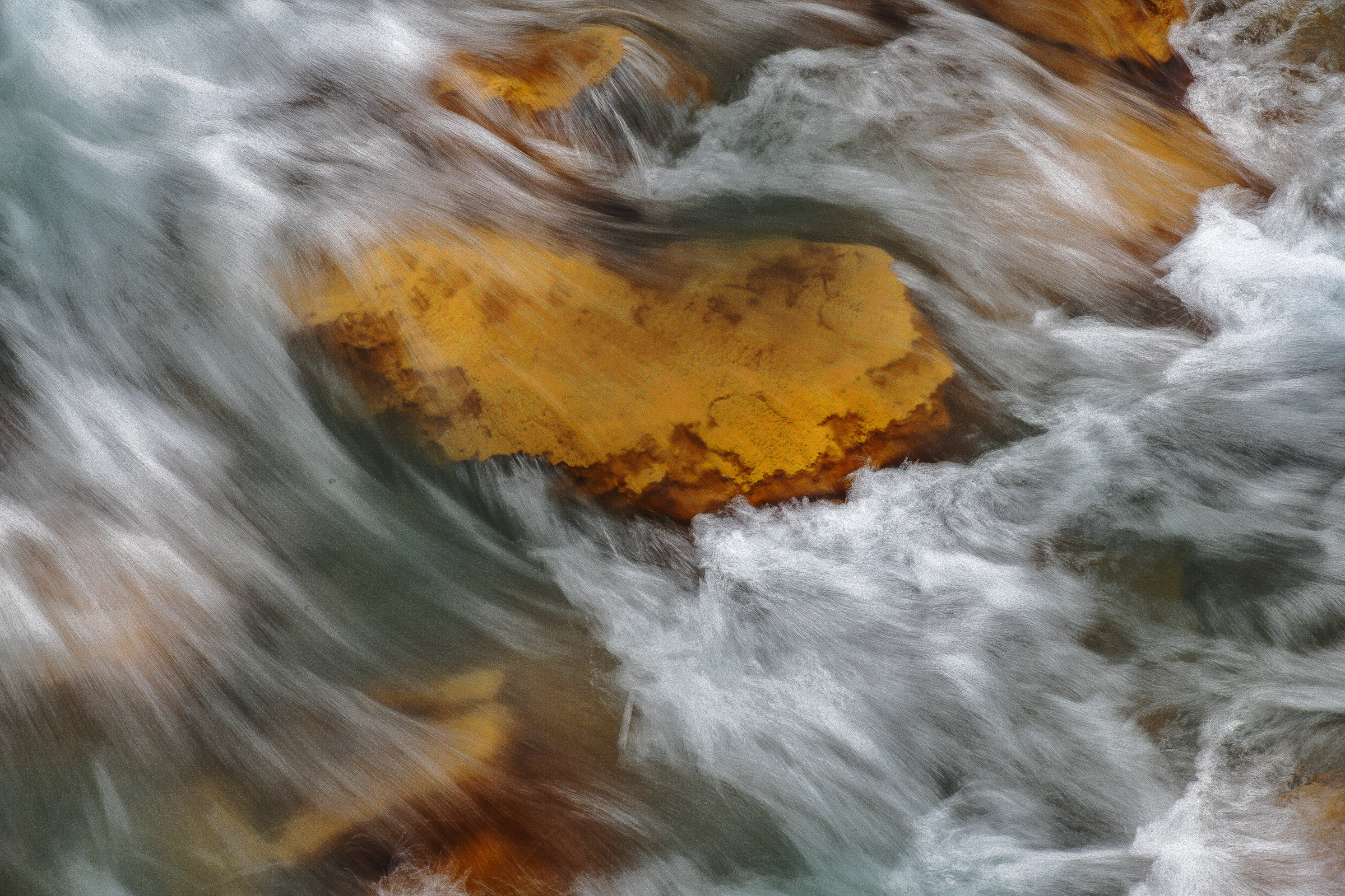 Water flows over a rock in the Lackwanna River at...