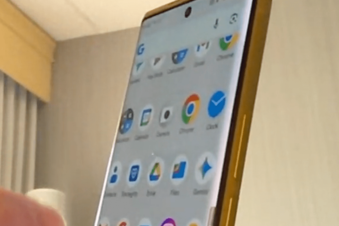 Image of Trump phone on a web call, showing its angled body