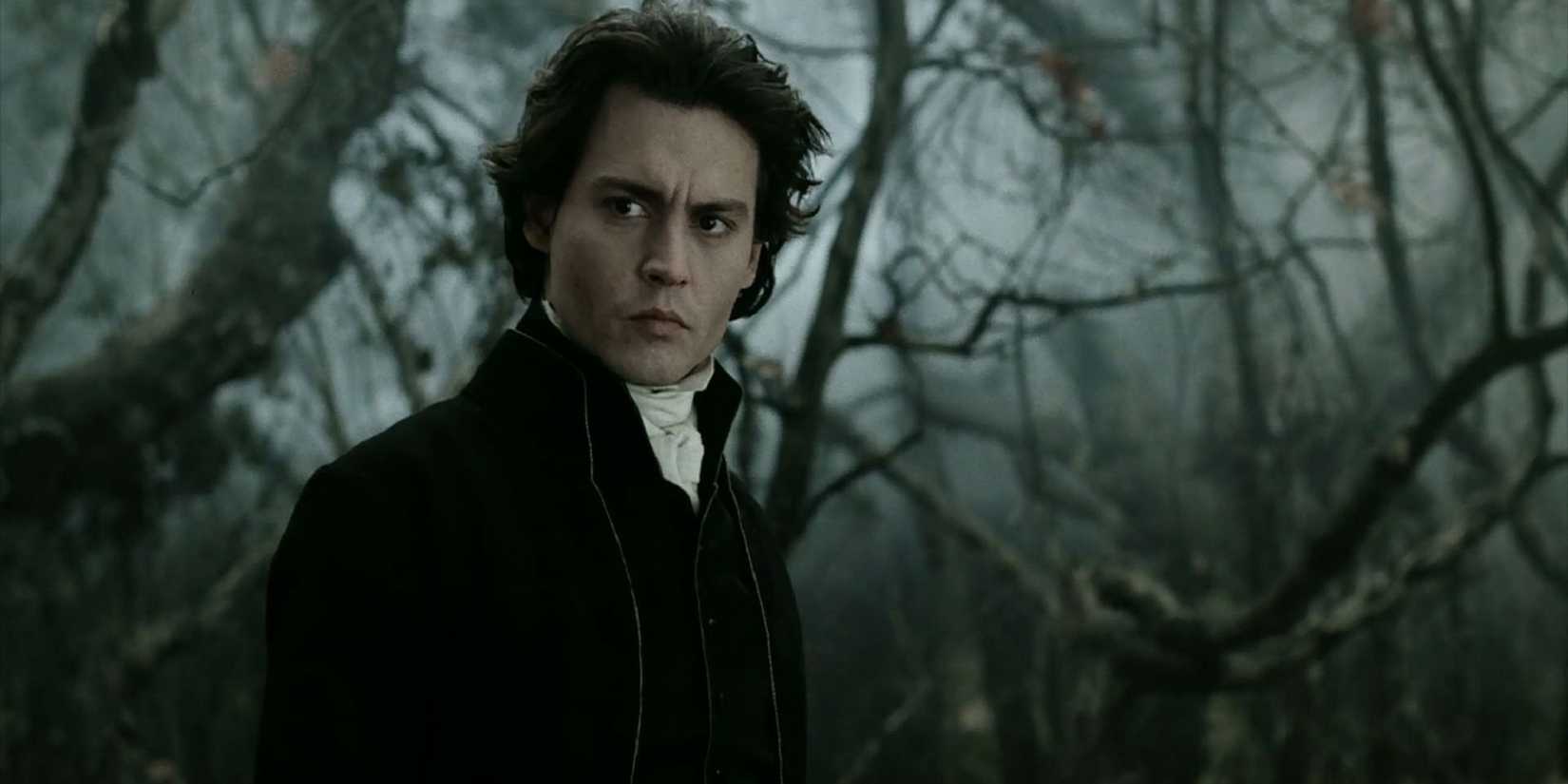 Ichabod Crane (Johnny Depp) in the gloomy forest of Sleep Hollow.