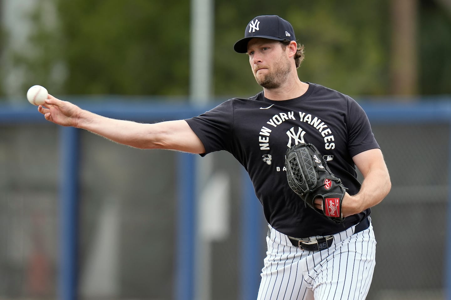 Gerrit Cole, who is recovering from Tommy John surgery, works on pickoff drills early in spring training.