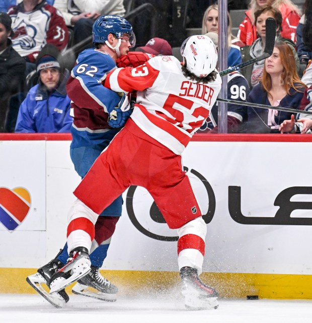 Moritz Seider (53) of the Detroit Red Wings checks Artturi Lehkonen (62) of the Colorado Avalanche during the third period of the Red Wings' 2-0 win at Ball Arena on Tuesday, February 2, 2026. (Photo by AAron Ontiveroz/The Denver Post)