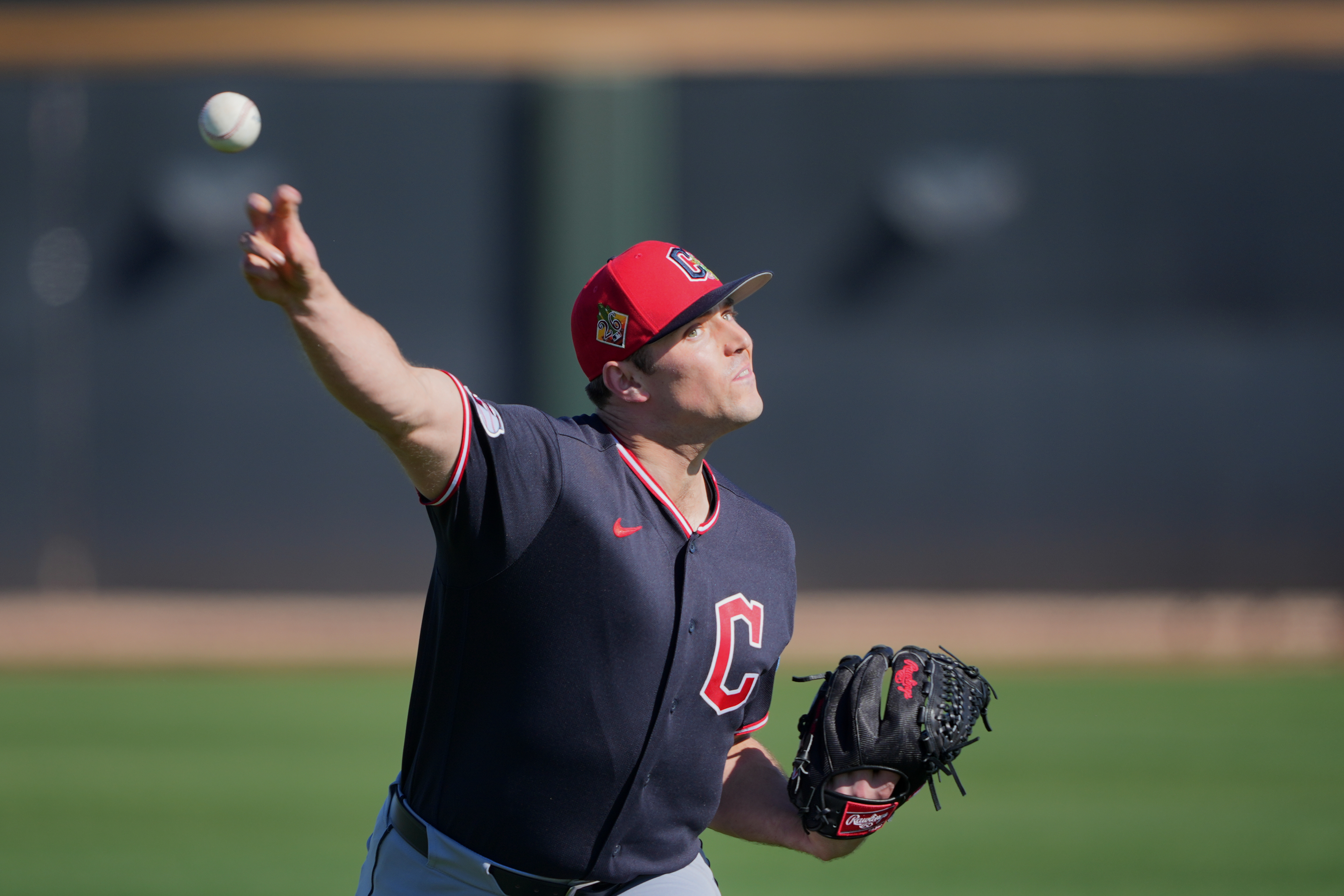 Cleveland Guardians pitcher Cade Smith works out during spring training...