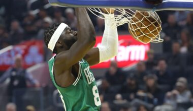 Neemias Queta dunks the ball