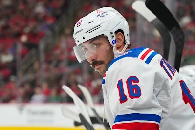 New York Rangers center Vincent Trocheck New York Rangers center Vincent Trocheck looks on from the bench