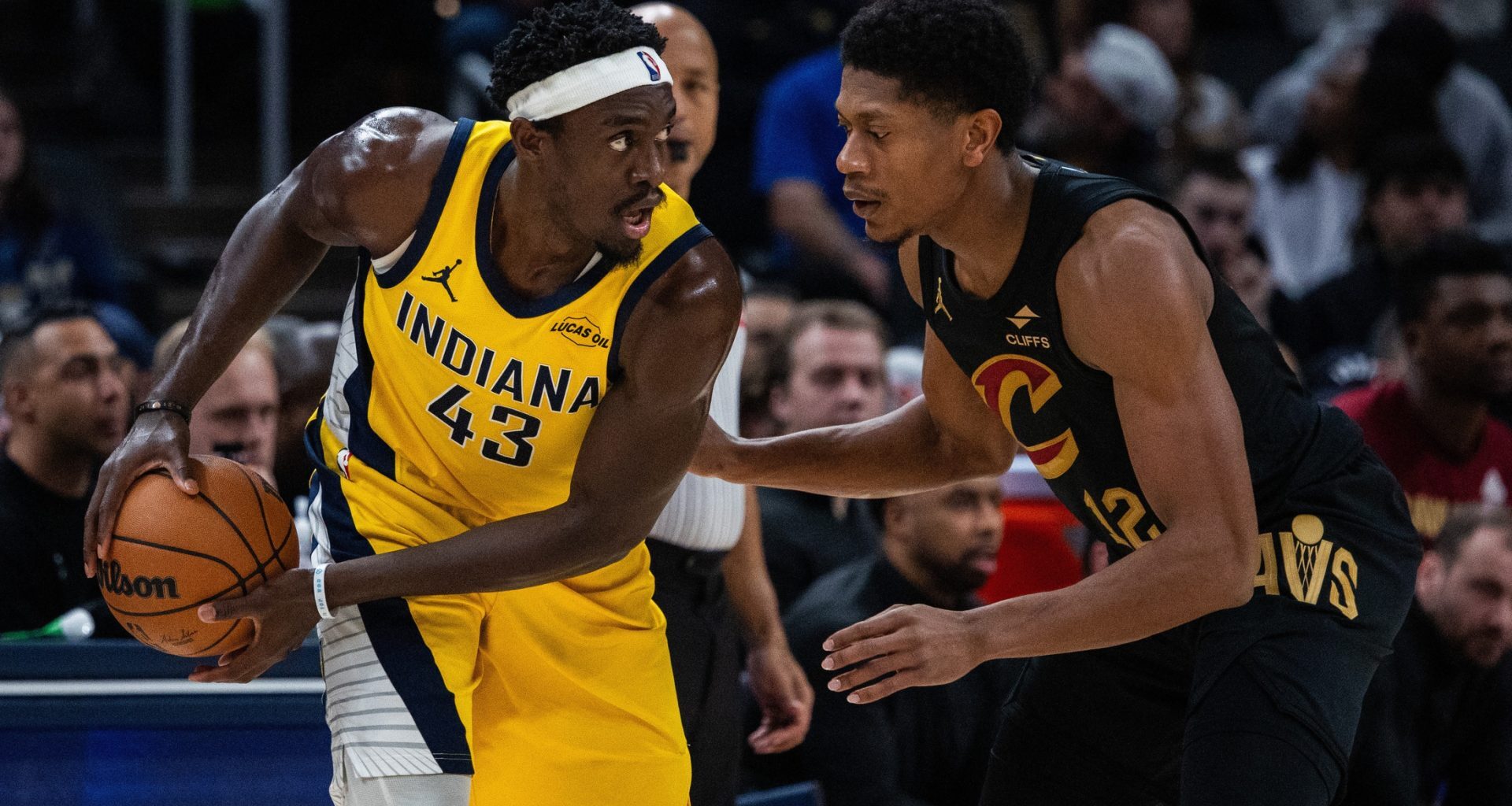 Jan 6, 2026; Indianapolis, Indiana, USA; Indiana Pacers forward Pascal Siakam (43) holds the ball while Cleveland Cavaliers forward/guard De'andre Hunter (12) defends in the first half at Gainbridge Fieldhouse.