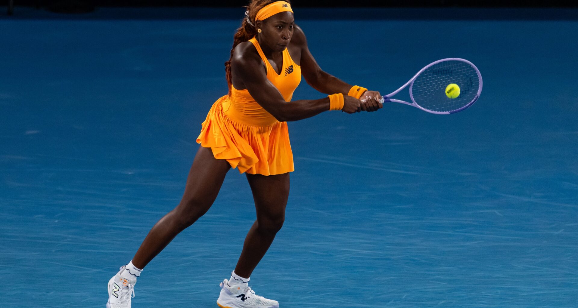 Coco Gauff hits a backhand against Elina Svitolina at the 2026 Australian Open.