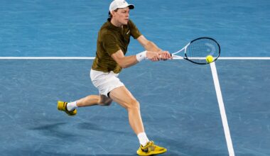 Jannik Sinner hits a backhand against Novak Djokovic at the 2026 Australian Open.