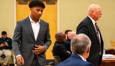 Ole Miss quarterback Trinidad Chambliss returns to his seat after testifying during the hearing in his lawsuit against the NCAA at Calhoun County Courthouse in Pittsboro, Miss., on Thursday, Feb. 12, 2026. Chambliss is looking for a temporary injunction and a permanent injunction against the NCAA for one more year of eligibility.