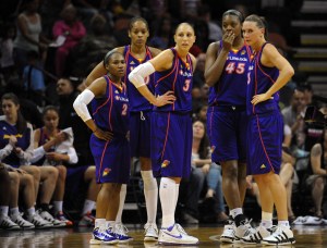 August 28, 2010; San Antonio, TX, USA; Phoenix Mercury players (from left) Temeka Johnson and Tangela Smith and Diana Taurasi and Kara Braxton and Penny Taylor wait for the start of the second quarter against the San Antonio Silver Stars during the first half at the AT&T Center. Phoenix beat San Antonio 92-73. Mandatory Credit: Brendan Maloney-USA TODAY Sports