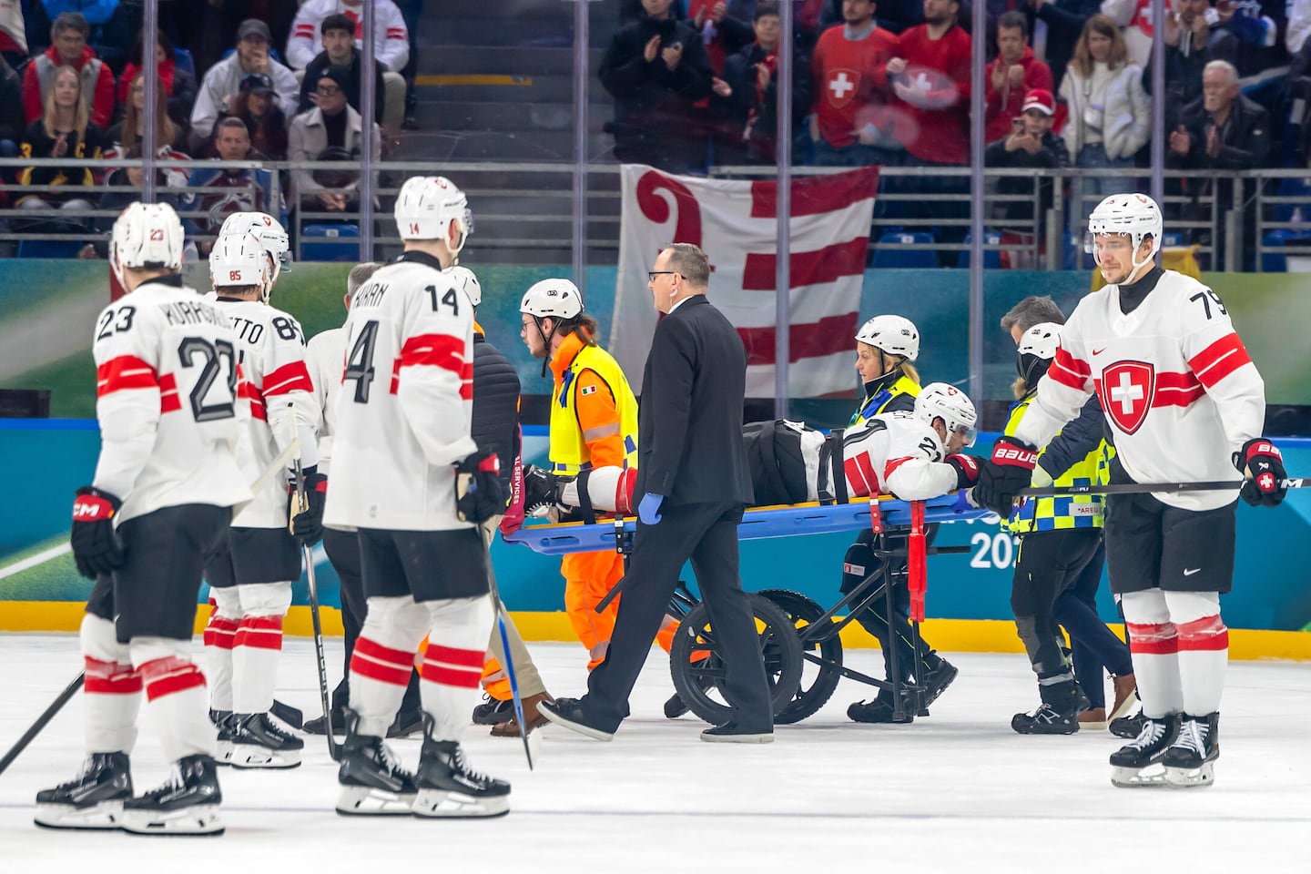 Switzerland's Kevin Fiala was stretchered off the ice after breaking his leg in the Olympics, putting a damper on the Kings' playoff hopes.