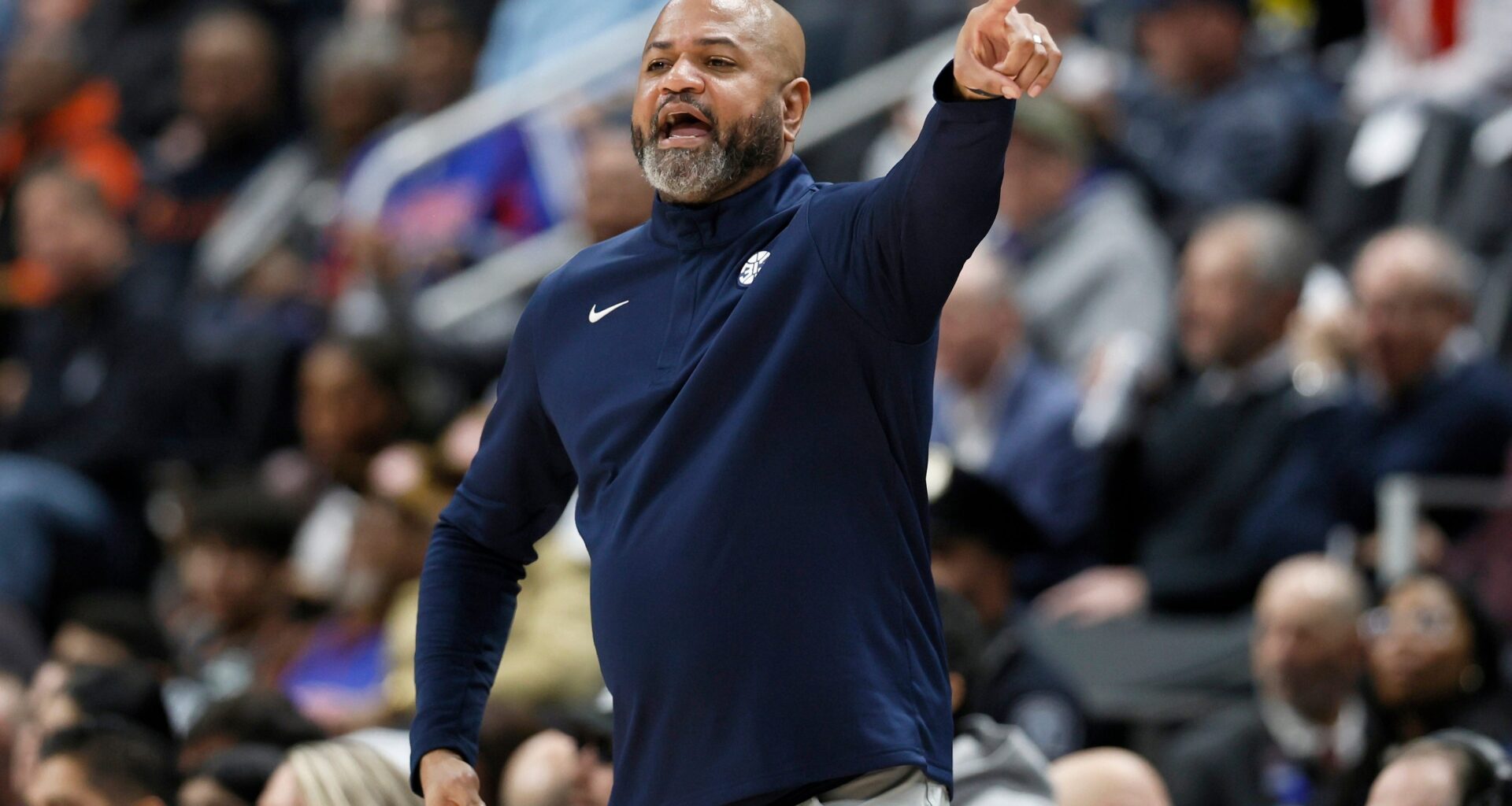 J.B. Bickerstaff shouts to his team from the sidelines