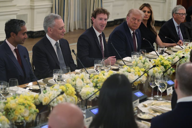 Meta CEO Mark Zuckerberg speaks as  U.S. President Donald Trump and first lady Melania Trump listen during a dinner at the State Dining Room of the White House on Sept. 4, 2025, in Washington, DC.