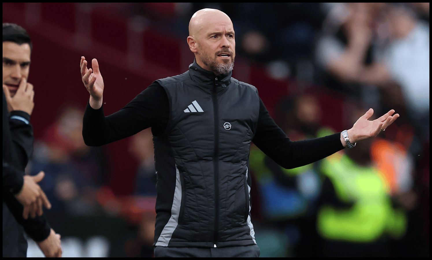 Erik ten Hag reacts angrily on the touchline.