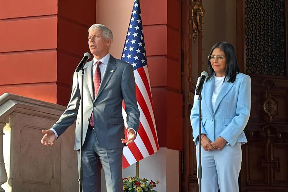 Venezuelan interim president Delcy Rodriguez (R) and US Secretary of Energy Chris Wright (L) hold a joint press conference