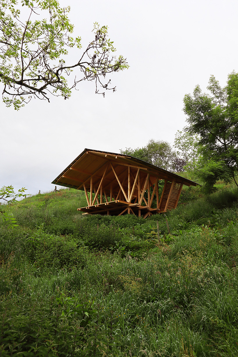 gabled timber observation pavilion promotes agroforestry in asturias, spain