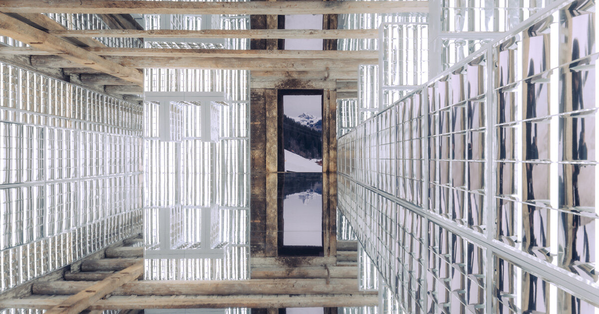 alexandre de betak inserts reflective light installation into swiss barn