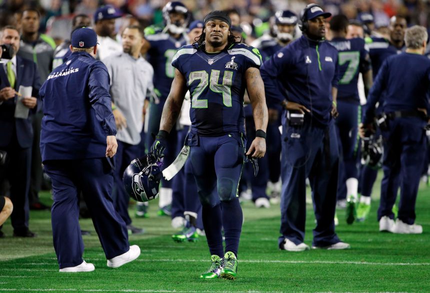 Seattle Seahawks running back Marshawn Lynch (24) walks off the field after the Seahawks lost to the New England Patriots during the NFL Super Bowl XLIX football game, Feb. 1, 2015, in Glendale, Arizona.