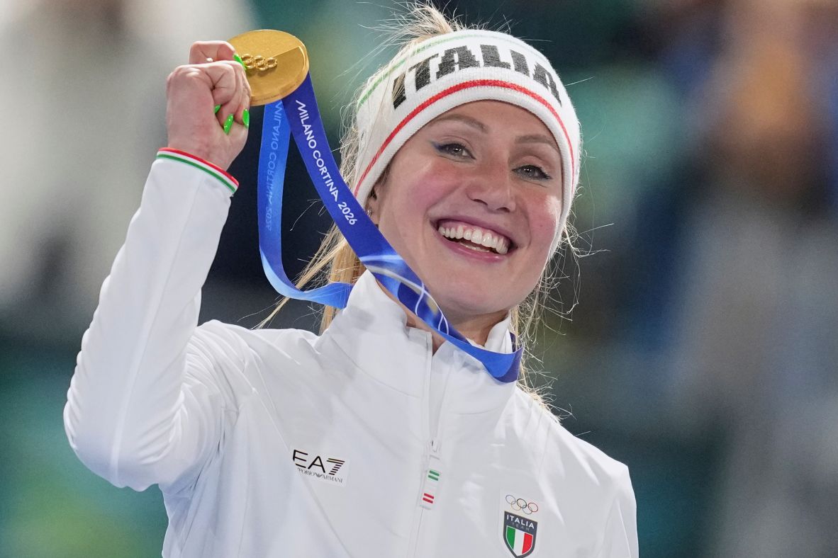 Italian speedskater Francesca Lollobrigida holds up the gold medal she won in the 3,000 meters on February 7. On her 35th birthday and in front of a home crowd, <a href=