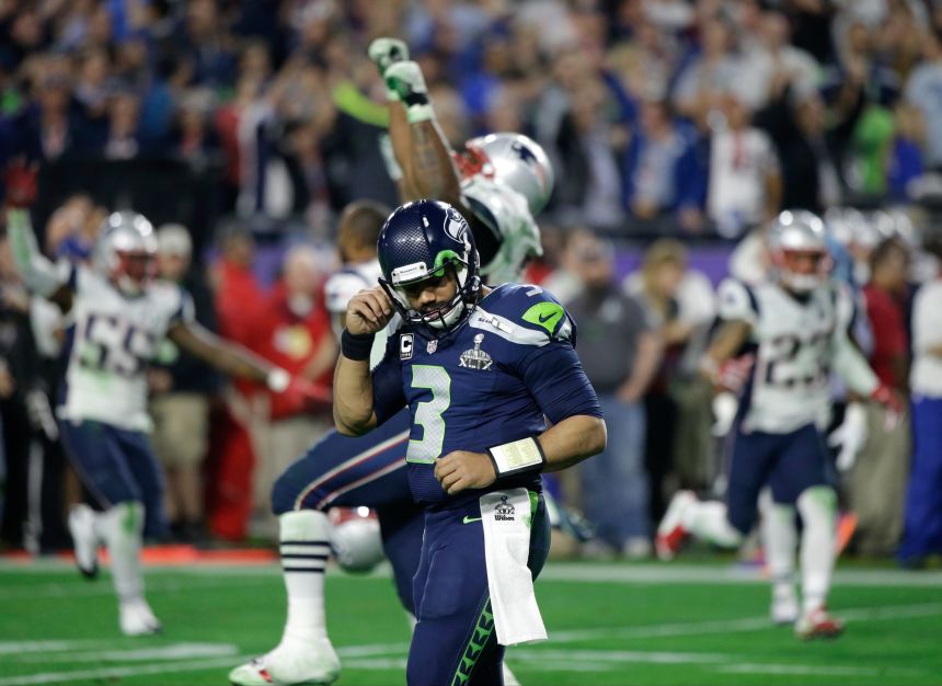 In this Feb. 1, 2015, file photo, Seattle Seahawks quarterback Russell Wilson (3) reacts after throwing an interception to New England Patriots strong safety Malcolm Butler during the second half of the NFL Super Bowl XLIX football game, in Glendale, Arizona.