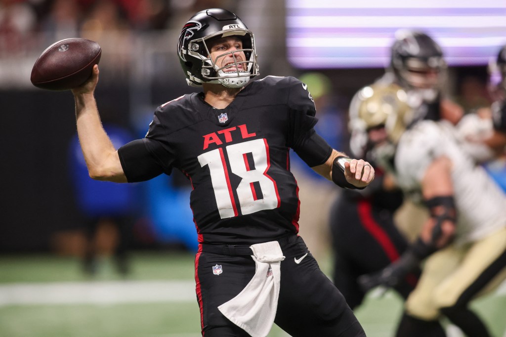 Atlanta Falcons quarterback Kirk Cousins (18) throws a pass.