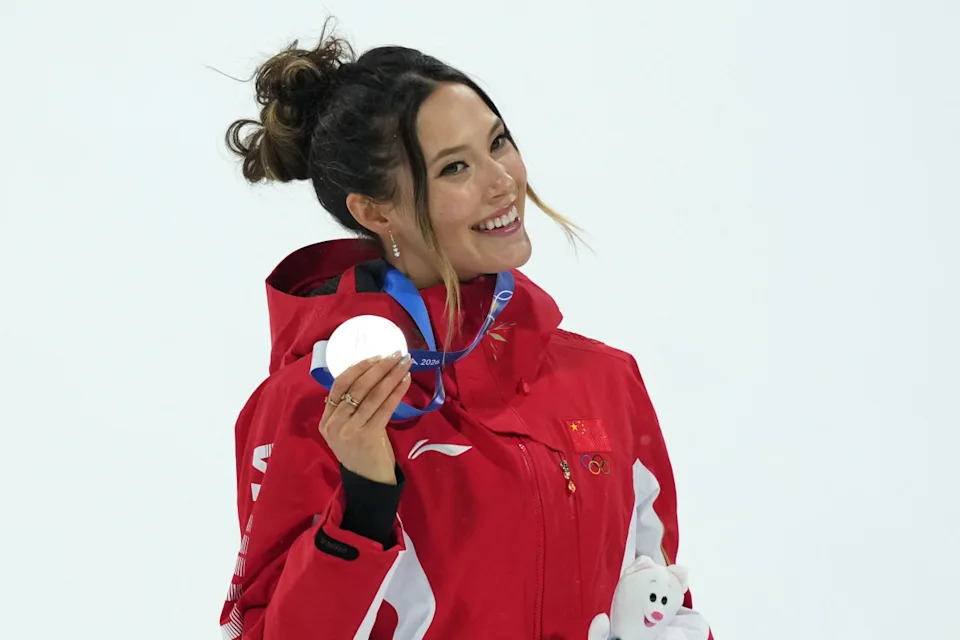 Feb 16, 2026; Livigno, Italy; Silver medalist Ailing Eileen Gu of the People's Republic of China celebrates during the medal ceremony for the women's big air final during the Milano Cortina 2026 Olympic Winter Games at Livigno Snow Park. Mandatory Credit: Joe Camporeale-Imagn Images© Joe Camporeale-Imagn Images&period;