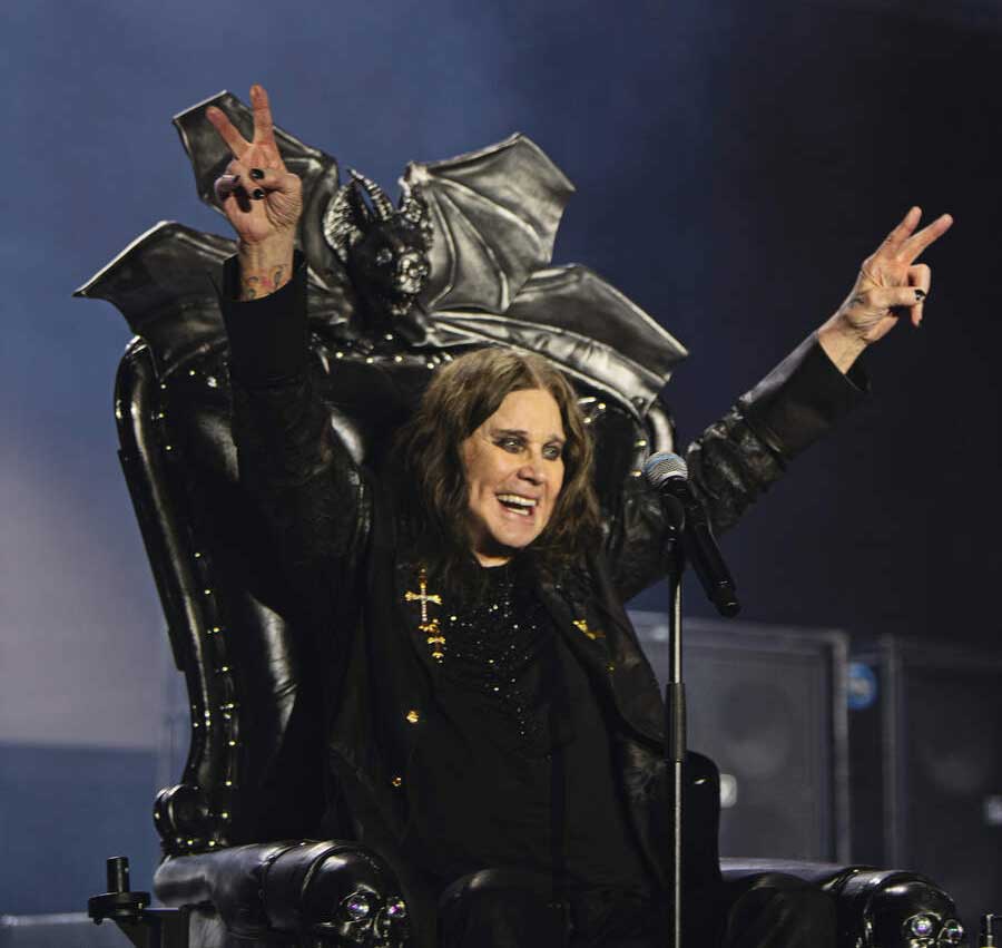 Ozzy Osbourne salutes the crowd from his onstage throne at Villa Park