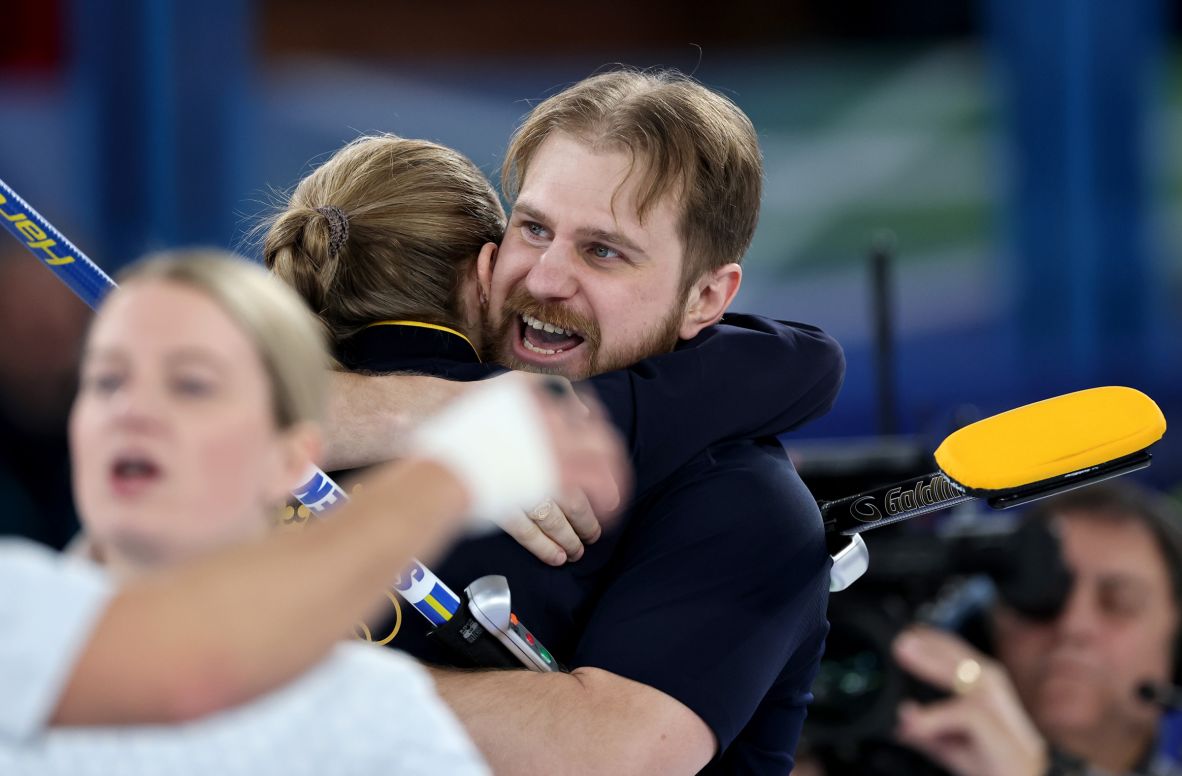 Rasmus Wranå hugs his sister, Isabella, after they won gold in mixed doubles curling on February 10. They defeated Korey Dropkin and Cory Thiesse of the United States. Thiesse <a href=
