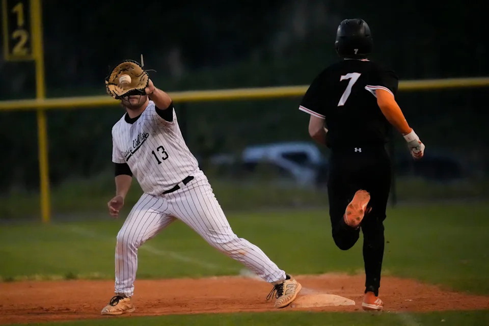 Sipsey Valley's Andrew White (13) takes a throw to get Fayette County's Brayden Unger (7) at first at Sipsey Valley High Monday, April 14, 2025.
