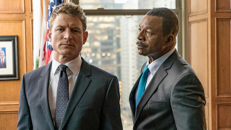 Peter Stone and Mark Jefferies stand near each other