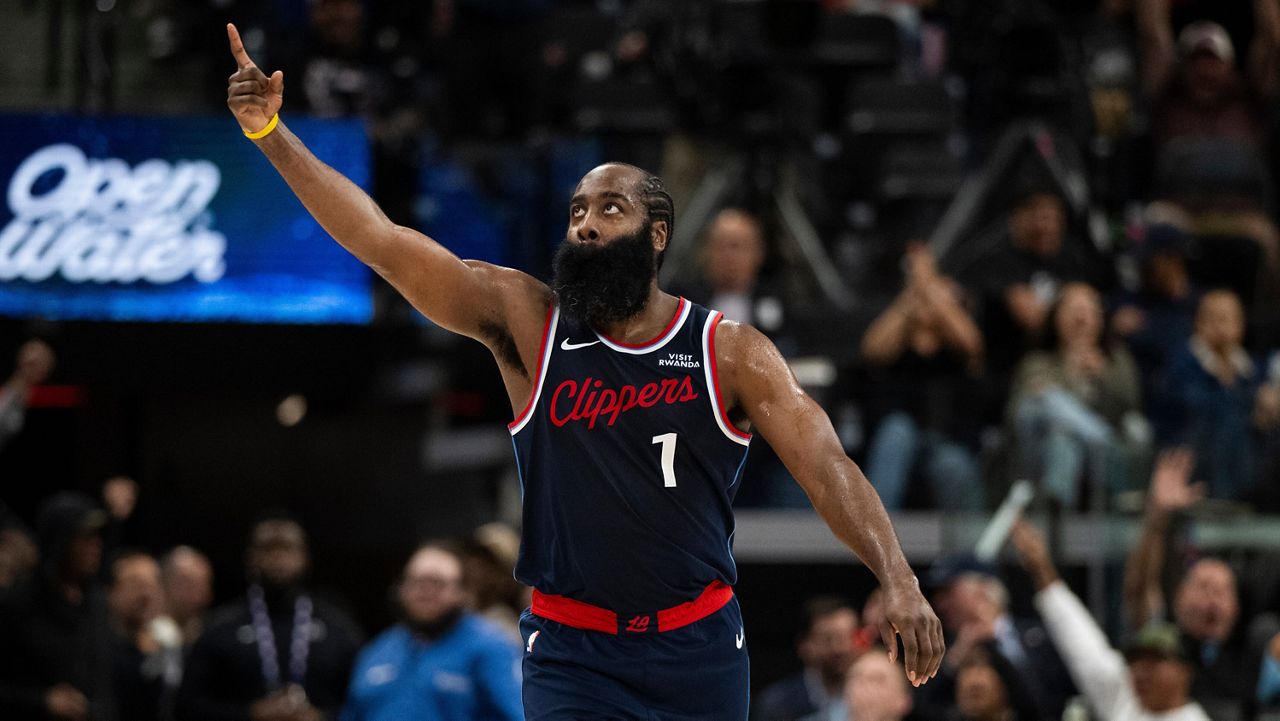 Los Angeles Clippers guard James Harden (1) gestures after scoring a basket during the first half of an NBA basketball game against the Phoenix Suns, Friday, Oct. 24, 2025, in Inglewood, Calif. (AP Photo/Kyusung Gong)