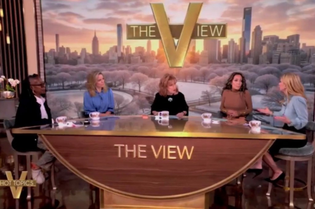 Five women on "The View" set, with Sara Eisen discussing economic policies.
