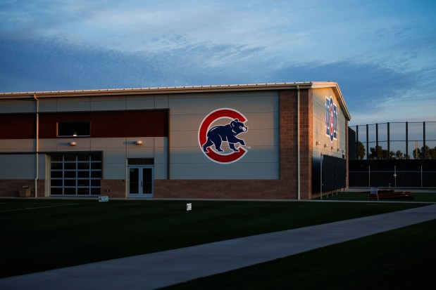 The sun rises before the Cubs first full-squad workout during spring training at Sloan Park on Feb. 16, 2026, in Mesa, Ariz. (Armando L. Sanchez/Chicago Tribune)