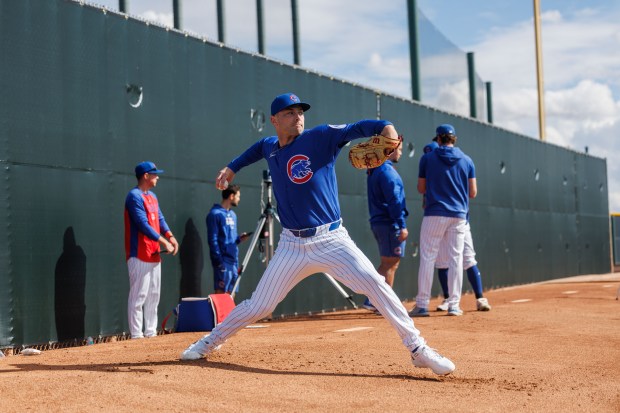 Pitcher Corbin Martin throws in the bullpen area during spring training at Sloan Park Tuesday Feb. 17, 2026 in Mesa, Ariz. (Armando L. Sanchez/Chicago Tribune)