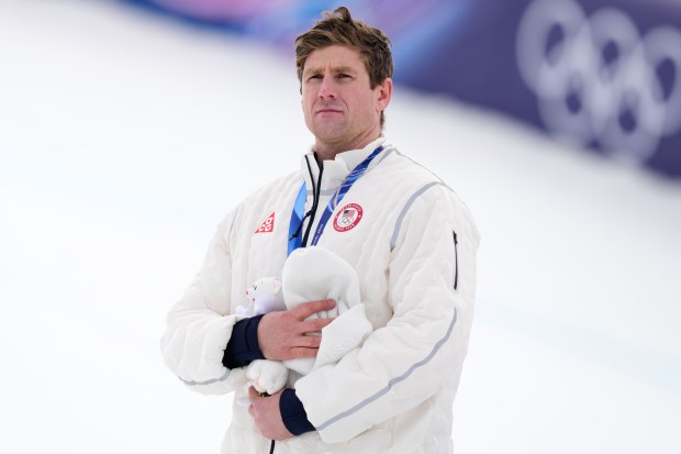 Silver medalist Ryan Cochran-Siegle of the United States attends the podium ceremony for the men's super-G race at the 2026 Winter Olympics on Wednesday, Feb.11, 2026, in Bormio, Italy. (AP Photo/Julia Demaree Nikhinson)