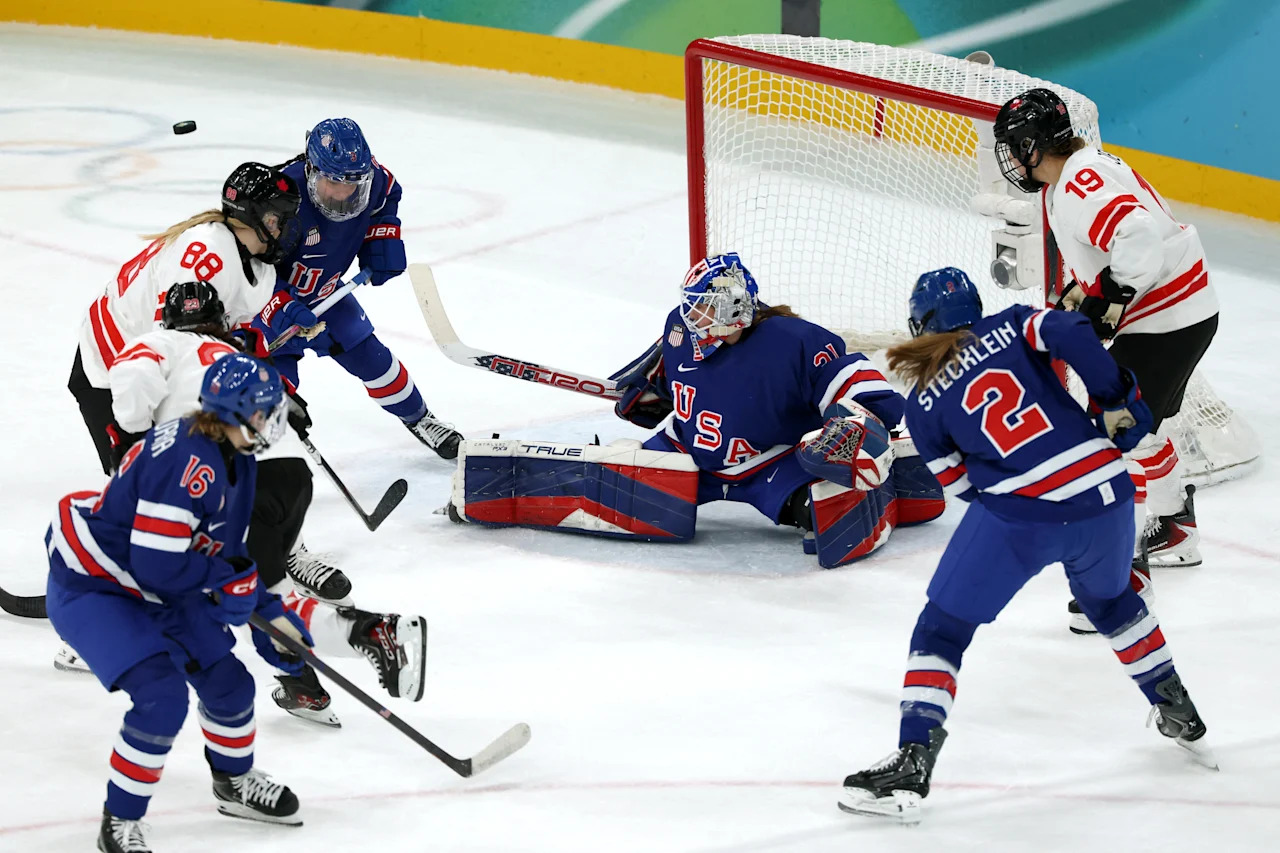 Milano Cortina 2026 Olympics - Ice Hockey - Women's Gold Medal Game - United States vs Canada - Milano Santagiulia Ice Hockey Arena, Milan, Italy - February 19, 2026. Julia Gosling and Brianne Jenner of Canada in action with Aerin Frankel, Hayley Scamurra and Lee Stecklein of United States REUTERS/Mike Segar