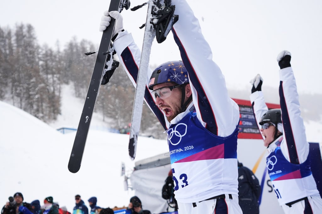The US’ Christopher Lillis (left) and Kaila Kuhn celebrate their win. Photo: AP