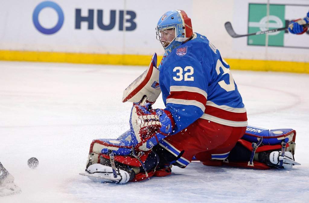 New York Rangers goaltender Jonathan Quick (32) deflecting the puck during a game against the Carolina Hurricanes.