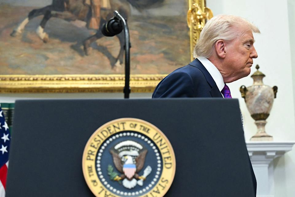 TOPSHOT - US President Donald Trump departs after making an announcement in the Roosevelt Room of the White House in Washington, DC on February 12, 2026. President Donald Trump on Thursday revoked a landmark scientific finding that underpins US regulations aimed at curbing planet-warming pollution, marking the administration's most far-reaching rollback of climate policy to date. (Photo by SAUL LOEB / AFP via Getty Images)
