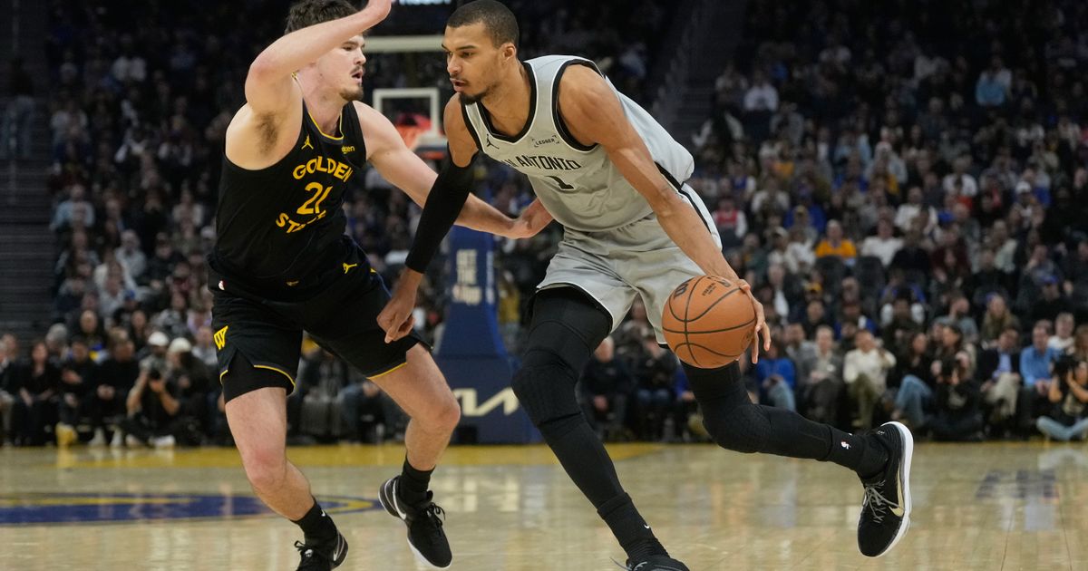Fox and Wembanyama lead the Spurs past the Warriors 126-113 for their 6th straight win :: WRAL.com