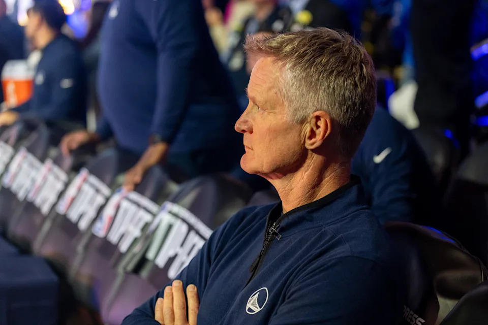 Oct 23, 2025; San Francisco, California, USA; Golden State Warriors head coach Steve Kerr watches introductions before the game against the Denver Nuggets at Chase Center. Mandatory Credit: Bob Kupbens-Imagn Images